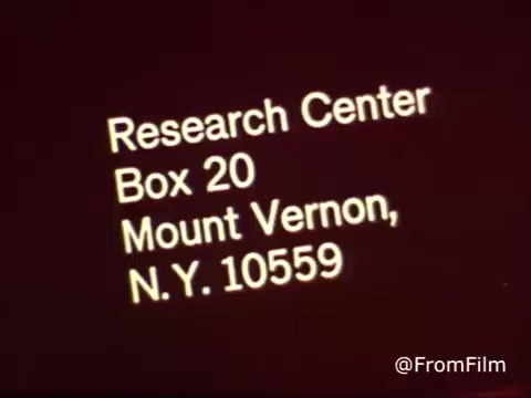The still features text that reads 'Research Center, Box 20, Mount Vernon, N.Y. 10559,' likely indicating the contact information for a Colgate research facility. The color tone is indicative of a 1970s 16mm print, with a warm, slightly faded appearance. This frame is part of a Colgate toothpaste commercial featuring MFP fluoride, which was popular during that era.