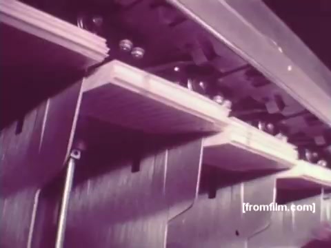 The still from 'IBM: Once Upon A Punched Card' (1964) showcases a close-up of a punch card mechanism in action. The focus is on the intricate machinery used to handle and process punch cards, highlighting the technology of the era. This visual captures the essence of early computing, illustrating the evolution of data processing methods. A blend of machinery and innovation, it represents a significant chapter in the history of computing.  Follow us on Twitter @FromFilm.