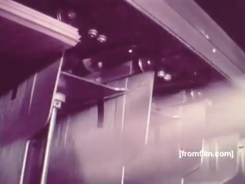 The still from 'IBM: Once Upon A Punched Card' (1964) likely depicts a close-up view of early computing machinery, showcasing the intricate mechanics of punch card technology. You can see components like rotating wheels and the punch card slots in action, emphasizing the significance of punch cards in data processing during that era. The focus on movement and machinery illustrates the transition from manual data entry to automated systems. This film highlights the historical evolution of computing, providing context to IBM's role in shaping technology. Follow @FromFilm for more insights!