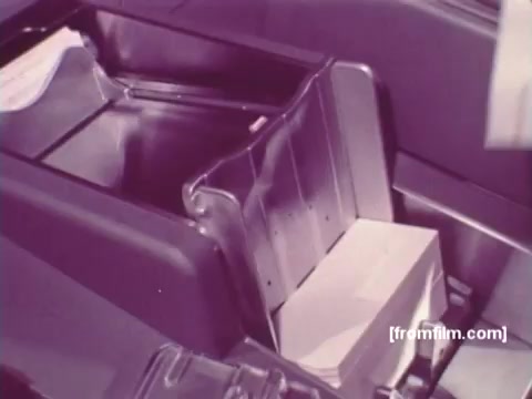 The still from 'IBM: Once Upon A Punched Card (1964)' showcases a close-up of a punch card input system. The 16mm print highlights the mechanical design typical of vintage computing, emphasizing the functionality of punch cards in data processing. The scene reflects the technological evolution of the era, illustrating how information was entered and processed using these early computing methods. The dominant colors and visual texture reveal the film’s historical context, capturing a pivotal moment in the development of information technology.   Follow us on Twitter @FromFilm.