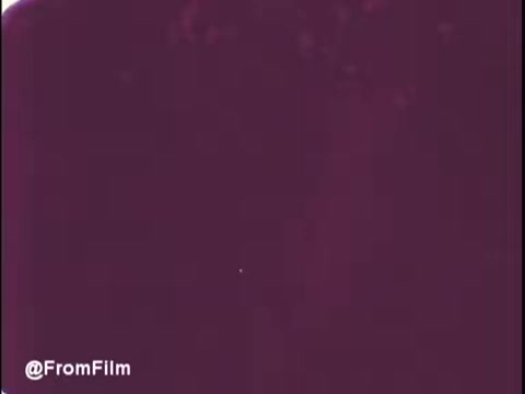 The still appears to be from a 16mm print of a Pamper's diapers commercial from the early 1970s. It likely captures the nostalgic style and visual aesthetics typical of that era, focusing on the comfort and reliability of the product.   As for the identity of any individuals in the segment, I cannot confirm whether it is Paul Walker.