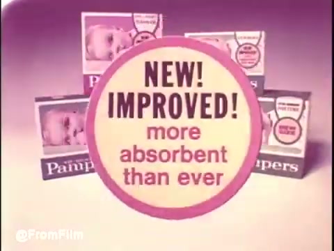 The still from the early 1970s Pamper's diapers commercial features a vibrant design highlighting the product's improvements. A circular graphic states 'NEW! IMPROVED! more absorbent than ever,' surrounded by images of Pamper's diaper packages. The overall aesthetic reflects the era's advertising style, focusing on clear and bold messaging.   As for the person in the first segment, I don't know who they are.   Follow us on Twitter @FromFilm for more updates!