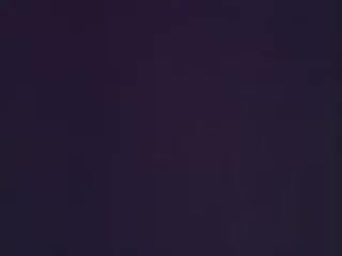 The still likely depicts a scene related to the era of the 1975 federal fuel economy standards, emphasizing the importance of gas mileage. The context suggests a discussion on rising fuel prices and the necessity of checking gas mileage on vehicle window stickers. It conveys a message about consumer awareness and the shift in priorities regarding fuel efficiency during that time.