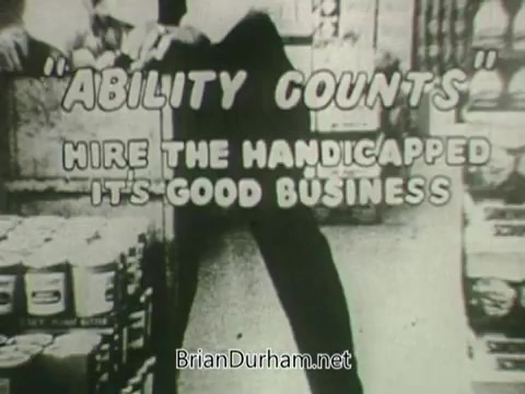 The still from the 'Hire the Handicapped' PSA features a bold message emphasizing that 'Ability Counts.' It promotes the hiring of veterans and handicapped individuals, highlighting their eagerness to learn and serve customers effectively. The central theme encourages viewers to reconsider their perceptions of disability in the workforce, framing the inclusion of these individuals not just as a moral obligation, but as beneficial for businesses. The message echoes a call to action, urging people to recognize the potential and value of all workers.