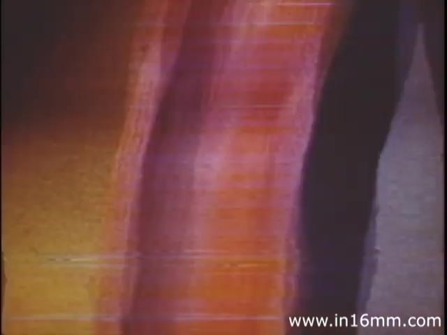 The still from 'I Am Joe's Stomach' captures the essence of 1980s animation and educational film techniques. It showcases vibrant, abstract colors that likely represent the stomach's functions. The contrasting hues may symbolize various digestive processes or the effects of different foods. The use of three-dimensional animation combined with live-action sequences aims to engage viewers by illustrating complex biological concepts through a relatable narrative centered on a character's digestive troubles. The aesthetic reflects the era's stylistic choices, blending visual intrigue with educational content.