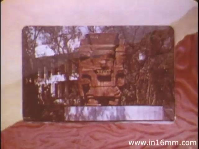 The still from 'I Am Joe's Stomach' presents a vivid 16mm frame that showcases a blend of three-dimensional animation and live-action sequences. The image likely features a stylized representation of the human stomach, embodying the character of 'Joe.' The visual theme focuses on the complexities of the stomach's functions and the significance of digestive health, using engaging graphics to illustrate Joe's challenges related to digestion. The integration of humor and educational content is a hallmark of this 1980s production, aimed at making the intricate workings of the digestive system accessible and entertaining for viewers.