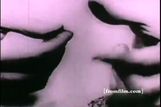 The still from 'Great Moments in History - Thomas Edison - Army Recruiting' appears to focus on two hands gracefully positioned, possibly in an expressive gesture. The overall tone is monochromatic, likely reflecting the aesthetic typical of 16mm prints from that era, which can evoke a sense of nostalgia. The image may symbolize themes of innovation or enlistment related to the historical context of Edison's influence or the military.