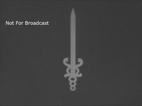 The still features a simple, stylized image of a sword, rendered in a monochromatic scheme typical of the 1960s. The sword is centrally positioned and has decorative elements at its hilt, possibly symbolizing strength or fighting against cancer. The text 'Not For Broadcast' is discreetly included in the corner, indicating this is a restricted preview. This visual aligns with the serious and motivational themes common in public service announcements from that era, particularly those aiming to raise awareness and advocate for health-related causes.