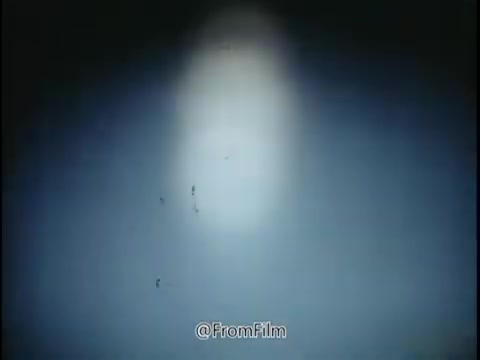 The still from the 1968 National Safety Council PSA likely conveys a sense of caution and awareness regarding driving conditions. The imagery evokes themes of hidden dangers on the road, such as rain, fallen leaves, and icy patches, which can create hazardous situations for drivers. The phrase 'the trap lies concealed' suggests that dangers are often not immediately visible, emphasizing the need for vigilance.  The use of lighting in the still, possibly highlighting specific elements or creating a sense of depth, adds to the dramatic effect. Overall, the visual elements reinforce the message about the importance of tire maintenance, speed management, and being conscious of environmental conditions while driving. The PSA serves as a reminder to be proactive and aware to prevent accidents.