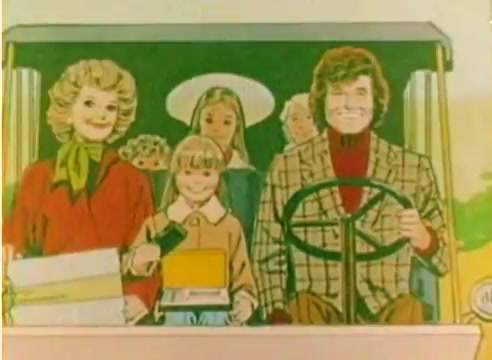 The still from the 'Kodak 1977 Sales Film' features a colorful illustration depicting a cheerful group of characters. Michael Landon and Dick Van Dyke are at the forefront: Landon, smiling and driving, while Van Dyke is next to him, showcasing a warm expression. They are accompanied by a woman in a red coat and a blonde child holding a gift. The backdrop is vibrant, emphasizing the festive mood of the Christmas season. The image reflects the appealing style of promotional materials from that era, designed to evoke joy and togetherness.