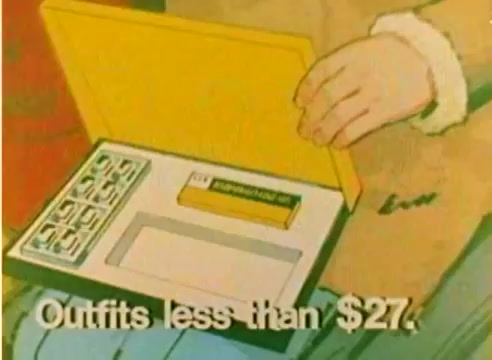 The still depicts a person’s hand holding an open box containing a yellow Kodak Super 8 film cartridge, alongside six film cartridges arranged in a compartment. Below the box, bold text reads, 'Outfits less than $27.' The overall scene suggests a promotional context for Kodak’s film products during the 1977 holiday season. The color palette is bright and cheerful, emphasizing a festive atmosphere.