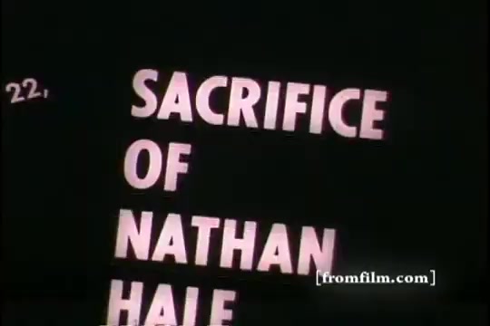 The still features a clear text reading 'SACRIFICE OF NATHAN HALE' against a black background. It is a frame from a 16mm print, likely part of a historical or educational film segment discussing the legacy of Nathan Hale, an American Revolutionary War figure known for his patriotism and sacrifice. The number '22,' appears at the top, possibly indicating a scene or segment number. The text is presented in a bold, straightforward manner, typical of mid-20th century film presentations.