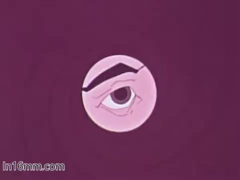 The still from the 'Blue Shield Hunting Safety PSA' features a stylized depiction of an eye against a plain purple background. The eye is surrounded by a circular shape, suggesting heightened awareness or vigilance, which aligns with the theme of hunting safety. The simple, animated design reflects the educational tone typical of 1960s public service announcements.