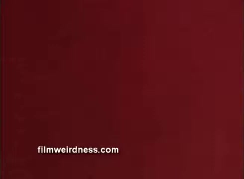 The still features a solid maroon background, with a watermark for 'filmweirdness.com' in the bottom left corner. There's no additional imagery or text visible, suggesting it might serve as a placeholder or an introductory frame related to the PSA about support for members of the Guard and Reserve. The lack of detail indicates a focus on the underlying message rather than visual elements.