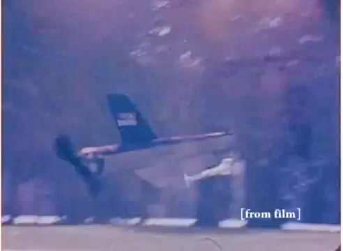 The 16mm still from the 'Flying Submarine' toy commercial showcases a unique toy that combines elements of both flight and underwater exploration. The scene captures the toy mid-air, suggesting its dual capabilities. The film, dated 1972, reflects a nostalgic era of imaginative toy design. The accompanying soundtrack is noted as the ‘good’ version, implying that there are alternate versions, including one labeled 'DO NOT USE'. The visual aesthetic likely features vibrant colors typical of toy advertisements from that time.