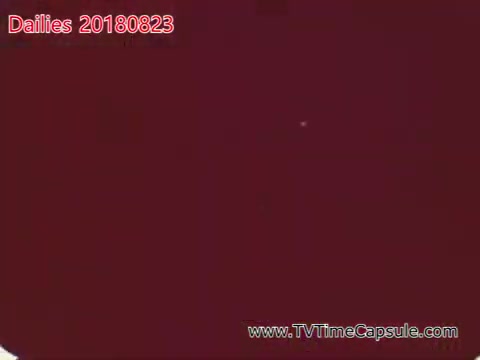 The 16mm still from 'dailies 20180823-scott-towels-etc' features a predominantly red background with a small white dot visible in the frame. The context suggests it may be part of film dailies, capturing experimental or raw footage without specific imagery or clear subject matter.