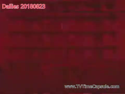 The still from 'dailies 20180823-scott-towels-etc' features a predominantly red background with visible text indicating the date and source. It's a simple frame likely captured from a film project, possibly a test or rough cut, focusing on color and display rather than detailed imagery.