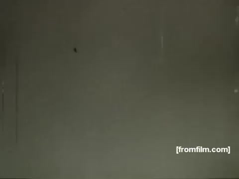 The still from the 1958 Tang commercial by UPA features a simple, minimalistic background typical of UPA's animation style. While the details of the animation are not visible, the period's aesthetic and focus on vibrant colors and playful designs are indicative of the era's advertising techniques. The print shows signs of age, typical of 16mm footage, with slight wear and imperfections. Overall, it represents a nostalgic piece of animation history.