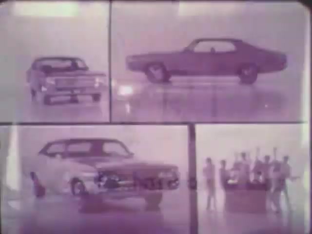The still features a collage of car images, showcasing different models in a stylized manner. The top two frames display classic cars, while the bottom left highlights a different vehicle model. The bottom right includes a group of people, possibly in a promotional setting. The overall aesthetic has a vintage feel, and the color scheme is muted, emphasizing the 16mm film quality. The use of VEGAS Pro suggests a creative editing approach.