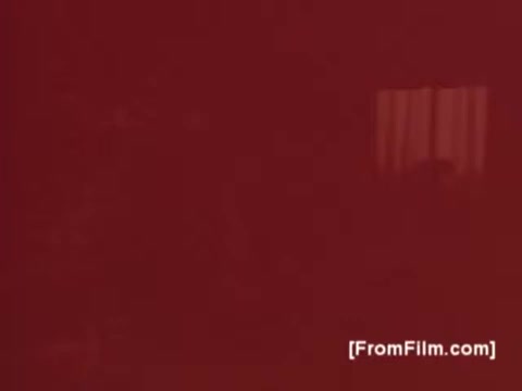 The still is characterized by a deep red background, indicative of the period's color palette in food advertising. It likely features visually appealing elements associated with cooking or the presentation of Betty Crocker Julienne Potatoes, emphasizing convenience and culinary creativity. The overall look is reflective of 1970s aesthetics, blending home cooking themes with vibrant colors.