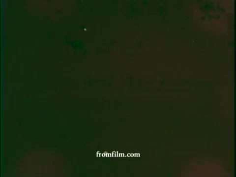 The still from the 16mm print of the ‘United Airlines - Deal of the Century’ commercial features a retro design typical of 1970s advertisements. It likely showcases promotional elements of a game show format, emphasizing excitement and attractive offers related to United Airlines. The visual quality reflects the era’s film stock, with muted colors and a vintage aesthetic. Overall, it captures the spirit of airline promotions from that time period.