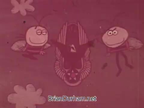 The still features a whimsical, animated scene from the 1967 Air Force Reserve recruiting commercial. Two cartoon bees, one on each side, hover over a central emblem that includes wings and a star, symbolizing the Air Force. The background is a muted reddish hue, with playful flower shapes, contributing to a lighthearted, engaging aesthetic aimed at attracting potential recruits.