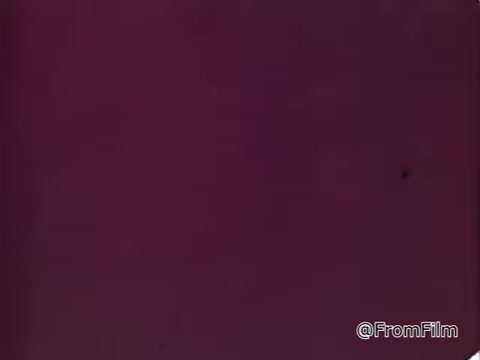 The still appears to be a solid background with a deep maroon color. Given the context of the PSA, it likely serves as a visual backdrop for messaging about the benefits of volunteering and personal growth, emphasizing simplicity and focus on the theme rather than intricate visuals.