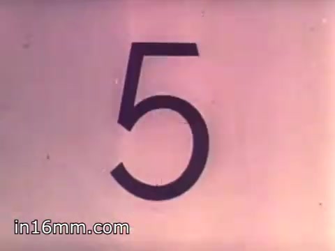 The 16mm still features a large, bold numeral '5' prominently displayed against a muted background. The simplicity of the design suggests it could be part of a countdown or a visual cue used in the context of military recruitment, specifically for Air Force Reserve recruiting efforts in 1968. The overall tone evokes a retro aesthetic typical of that era's film presentations.