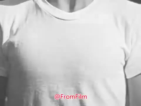 The still likely showcases a youthful figure in a simple white t-shirt, emphasizing fitness and physical activity. This aligns with the mission of the President's Council on Physical Fitness, established to promote health and exercise among American youth, particularly through initiatives like the Presidential Physical Fitness Award. The visual likely aims to inspire children to engage in physical fitness activities.