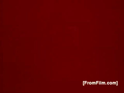 The still depicts a solid red background, likely serving as a backdrop for promotional content. It’s part of a series of ten-second WCBS station promos for Jim Jensen and Joel Siegel from the 1970s, presented in 16mm film format. The simplicity of the red color focuses attention on the message that would follow in the actual broadcast.