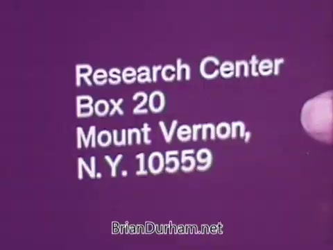 The still features a close-up of a hand pointing to text that reads 'Research Center, Box 20, Mount Vernon, N.Y. 10559.' The background is a solid purple color, creating a stark contrast with the white text. This visual is likely part of an advertising campaign or informational segment for Colgate in 1967.