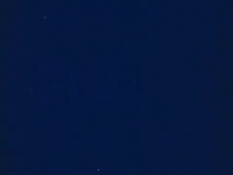 The still from the 'Flair Pens commercial' features a deep navy background, allowing the focus to remain on the text or graphics that convey the message. The phrase 'Now with point guard' suggests an innovative feature of the pen, emphasizing that it won't mush down, likely highlighting durability or improved writing quality. The clean, simple design aligns with the aesthetic of 1970s advertising, aiming for clarity and impact.   Follow us on Twitter @FromFilm for more insights!