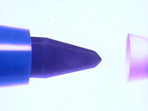 The still from the 1970s Flair Pens commercial showcases the pen's distinctive features, particularly focusing on the innovative point guard designed to prevent mushing. The close-up highlights the sleek tip of the pen, emphasizing its precision and usability. The vibrant colors of the pen stand out against a bright background, creating an engaging visual appeal. The tagline implies reliability and performance, aligning with the era's marketing style.   Follow us on Twitter @FromFilm!