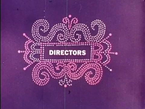 The still features the word 'DIRECTORS' prominently displayed in bold white text, framed by an ornate design made up of pink and white dots. The background is a vibrant purple, enhancing the visual appeal. This frame is part of the credits sequence from the Rocky and Bullwinkle show, showcasing a playful and classic animation style characteristic of that era.   Subscribe, like or follow us on Twitter @FromFilm.