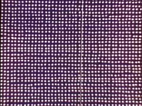 The still from the 'Rocky and Bullwinkle' show titles features a backdrop of evenly spaced light dots, creating a vibrant, textured pattern typical of 16mm film prints. This aesthetic aligns with the whimsical and playful nature of the credits, capturing the essence of the classic cartoon.   Subscribe, like or follow us on Twitter @FromFilm.