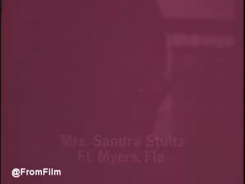 The still from the 'Cold Power Detergent' TV commercial features a blurred or colored background, likely representative of the 1960s advertising style. The name 'Mrs. Sandra Stultz' and 'F.L. Myers, Fla.' appear prominently, indicating a personal testimonial or endorsement, a common tactic in advertisements of that era to build trust. The overall aesthetic reflects the vintage charm of mid-20th-century commercials.    For more updates, follow us on Twitter at @FromFilm.