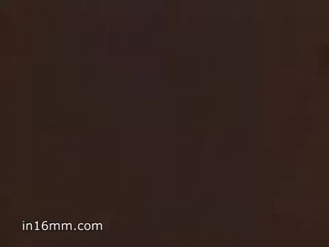 The still is from a 16mm color public service announcement (PSA) produced by the National Oceanic and Atmospheric Administration (NOAA) focused on boating safety and the importance of using NOAA Weather Radio. It likely emphasizes weather awareness for boating safety in a concise 30-second format.