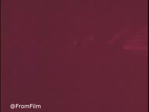 The 16mm still from the 1970s Colgate Pruf Spray Starch ad features a simple, perhaps stylized visual that evokes a nostalgic feel. The color palette suggests a retro aesthetic typical of the era. The emphasis seems to be on the product itself, likely showcasing its use in laundry and fabric care. The overall composition likely reflects the advertising styles of the time, focusing on clarity and persuasive marketing.  Follow us on Twitter @FromFilm for more!