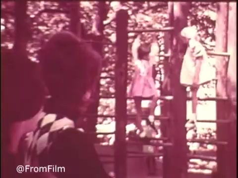 This still from the 1970s Colgate Pruf Spray Starch features playful children on a jungle gym, evoking a nostalgic, idyllic outdoor scene. The warm tones and soft focus reflect the era's aesthetic, highlighting carefree moments of childhood while subtly linking to the brand's fabric care message. Follow us on Twitter @FromFilm.