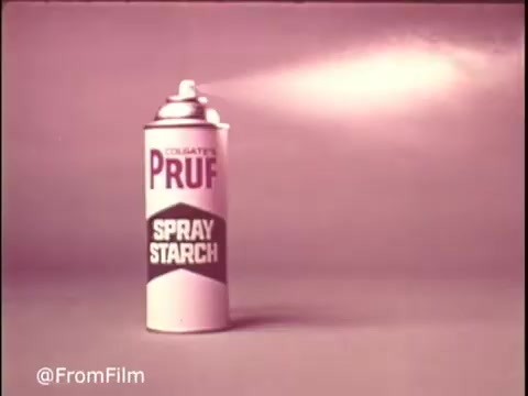 The still features a can of Colgate Pruf Spray Starch against a soft, pastel background. The can is prominently displayed, showcasing its design with the brand name 'PRUF' boldly typed above 'SPRAY STARCH.' Light reflects off the can, highlighting its smooth surface. This 1970s advertisement emphasizes simplicity and elegance in the product presentation.   Follow us on Twitter @FromFilm.