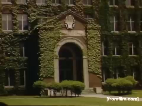 The still features a historic building covered in greenery, likely representing a school or institutional structure. The entrance, marked by a prominent arch, is framed by ivy, emphasizing a harmonious blend of architecture and nature. The image reflects mid-20th century aesthetics and perhaps captures the spirit of the Rochester/Niagara Falls area during that time.