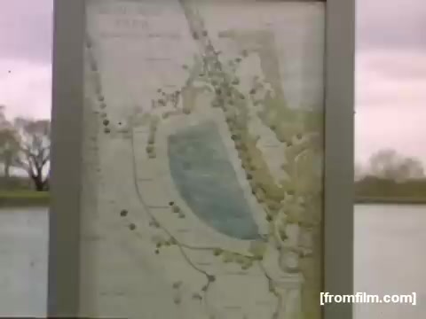 The still features a vintage map displayed in a frame, likely depicting the area around Rochester and Niagara Falls. The map includes outlines of water bodies and nearby landmarks, indicating points of interest or travel routes from the 1948-1950 period. The background shows a serene body of water and trees, capturing the natural landscape of the region. The overall tone reflects a nostalgic view of mid-20th century exploration and leisure.