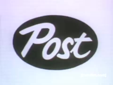 The still features the logo for Post, designed in a stylized, script font on a black oval background. The overall aesthetic reflects the vintage animation style of the 1950s, with a simple and clean presentation, typical of UPA's animation work during that era. The logo is likely used as a branding element in a commercial promoting Grape-Nuts Flakes.