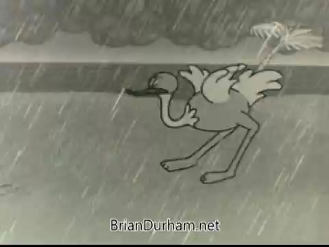 The still from the 1968 PSA 'If Disaster Strikes' features a cartoonish bird, resembling a stork, struggling to walk in heavy rain. The background depicts a stormy atmosphere, emphasizing the theme of natural disaster preparedness. The imagery conveys urgency and the challenges faced during adverse weather conditions.