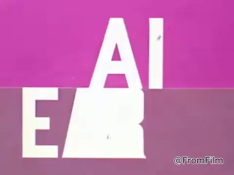 The still from the 1968 PSA 'Mail Early to Your Soldier' features bold typography that spells out parts of the phrase, creating a visually striking effect. The letters are prominently displayed against a two-tone background, with a blend of pink and purple hues. This color scheme emphasizes urgency and importance while maintaining a nostalgic tone, characteristic of visual media from that era.  The message promotes the timely mailing of gifts to servicemen overseas, stressing the need for wrapping packages well and providing clear addresses. The emphasis on a deadline and the encouragement for families to ensure their loved ones have a Merry Christmas ties into the emotional resonance of supporting troops during the Vietnam War. Overall, the design and content collectively convey a heartfelt message aimed at fostering connection between servicemen and their