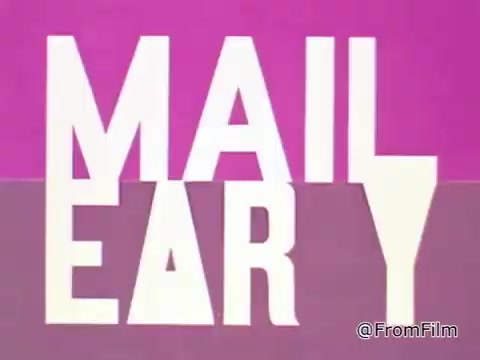 The still from the 1968 PSA 'Mail Early to Your Soldier' features bold, stylized text that emphasizes the phrase 'MAIL EARLY.' The letters are arranged in a dynamic, eye-catching manner, with a combination of white and other contrasting colors against a vibrant background, likely in shades of pink and purple. This design choice reflects the period's graphic style, aiming to capture viewers' attention effectively. The overall look seems intended to convey urgency and importance, encouraging families of servicemen to send gifts in time for the holidays, particularly as the voice-over underscores a specific mailing deadline.