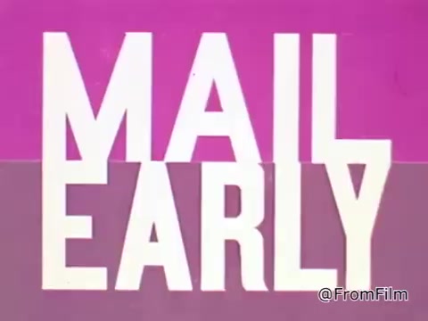 The still from the 1968 PSA 'Mail Early to Your Soldier' features bold, stylized typography that reads 'MAIL EARLY.' The text is presented in a graphic design typical of the time, with vibrant pink and purple colors creating a striking visual contrast. The large letters emphasize the urgency and importance of mailing packages in a timely manner, especially for servicemen stationed overseas. The design captures the essence of mid-20th-century advertising, aiming to convey a clear message about sending gifts and maintaining connections during the Vietnam War. Throughout the still, there's a sense of optimism and the holiday spirit, urging people to ensure their loved ones receive their gifts on time.
