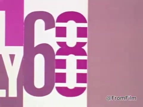 The still from the 1968 Public Service Announcement titled 'Mail Early to Your Soldier' features bold, graphic text emphasizing the urgency and importance of mailing packages to servicemen overseas. The numbers '68' are prominent and stylized, likely reflecting the year of the announcement. The color scheme consists of vibrant pinks and purples, creating a visually striking appeal. The design reflects the aesthetic of the late 1960s, balancing clarity with a sense of urgency, conveying a straightforward message about mailing deadlines and the importance of sending holiday cheer to soldiers during the Vietnam War.