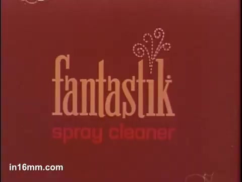 The still features the logo of 'fantastik spray cleaner' prominently displayed against a red background. The design is sleek and modern, with playful accents that suggest freshness and cleaning power. The lettering is bold and stylized, emphasizing the product's identity as a spray cleaner.