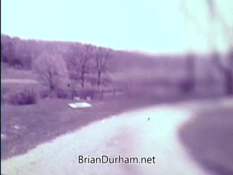 The still from the 'Prevent Blindness PSA - 1967' depicts a blurred landscape, emphasizing the theme of visual impairment associated with amblyopia, also known as lazy eye. The imagery likely represents how one might see with an affected eye, illustrating the key message that early detection and treatment are essential to prevent blindness in children. The PSA aims to raise awareness of the importance of good eyesight for children by highlighting that one in twenty preschoolers may experience eye problems.